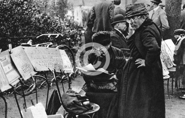 Stamp sellers in the Champs Elysees, Paris, 1931.Artist: Ernest Flammarion