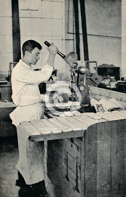 'Stamping Blocks of Soap', c1917. Artist: Unknown.