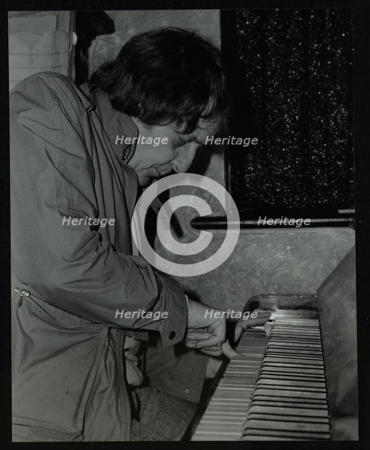 Stan Tracey playing the piano at The Bell, Codicote, Hertfordshire, 2 February 1986. Creator: Denis Williams.
