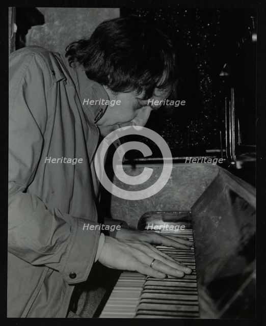 Stan Tracey playing the piano at The Bell, Codicote, Hertfordshire, 2 February 1986. Creator: Denis Williams.