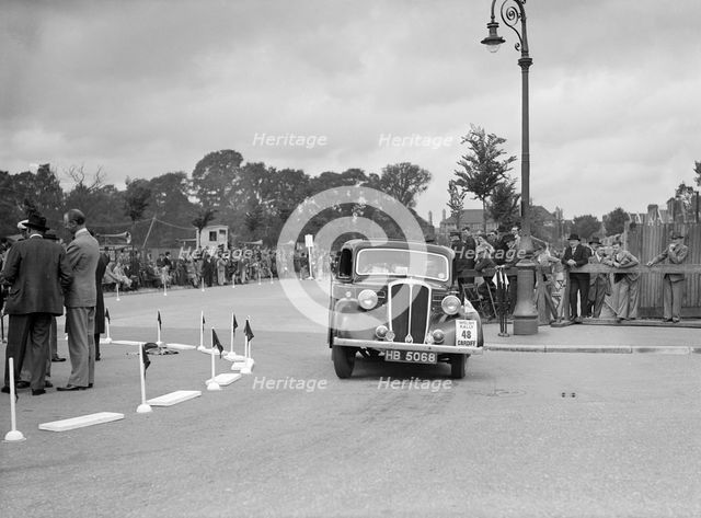 Standard 12 saloon of Miss I Webber competing in the South Wales Auto Club Welsh Rally, 1937 Artist: Bill Brunell.