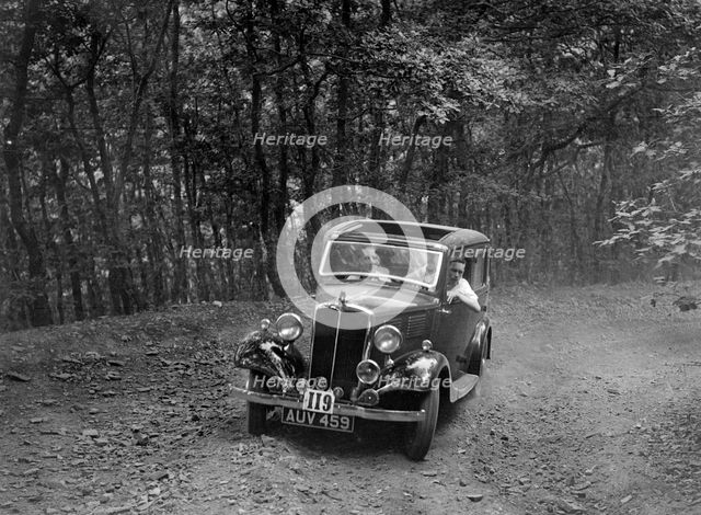 Standard competing in the B&HMC Brighton-Beer Trial, Fingle Bridge Hill, Devon, 1934. Artist: Bill Brunell.