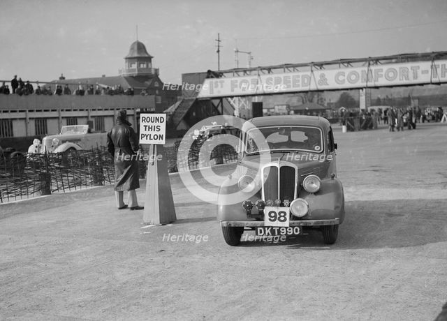 Standard competing in the JCC Rally, Brooklands, Surrey, 1939. Artist: Bill Brunell.