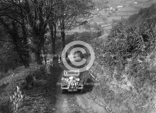 Standard Avon Ten taking part in a Standard Car Owners Club trial. Artist: Bill Brunell.