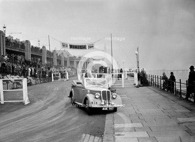 Standard Avon Twelve competing in the Blackpool Rally, 1936. Artist: Bill Brunell.