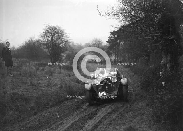 Standard Avon of J Priestly at the Sunbac Colmore Trial, near Winchcombe, Gloucestershire, 1934. Artist: Bill Brunell.