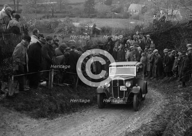 Standard of AV Spotiswoode competing in the MCC Exeter Trial, Ibberton Hill, Dorset, 1930. Artist: Bill Brunell.