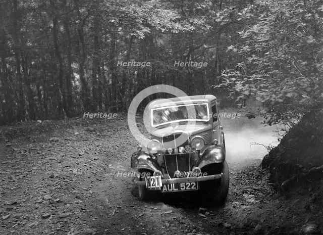 Standard Little Nine saloon, B&HMC Brighton-Beer Trial, Fingle Bridge Hill, Devon, 1934. Artist: Bill Brunell.