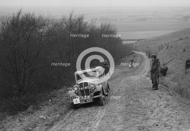 Standard Little Nine saloon competing in a trial, Crowell Hill, Chinnor, Oxfordshire, 1930s. Artist: Bill Brunell.