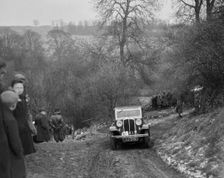Standard Nine saloon of Mrs M Vaughan competing in the Sunbac Colmore Trial, Gloucestershire, 1933. Artist: Bill Brunell