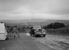 Standard saloon of Mrs SH Richards competing in the South Wales Auto Club Welsh Rally, 1937 Artist: Bill Brunell
