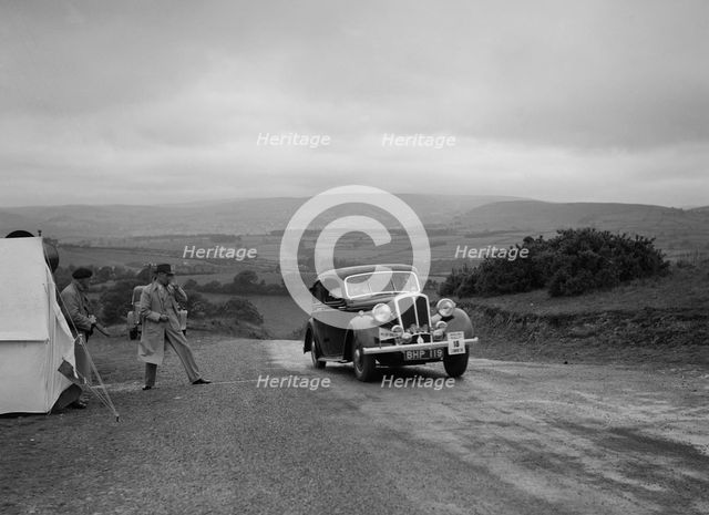 Standard saloon of Mrs SH Richards competing in the South Wales Auto Club Welsh Rally, 1937 Artist: Bill Brunell.