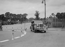 Standard saloon of Mrs SH Richards competing in the South Wales Auto Club Welsh Rally, 1937 Artist: Bill Brunell