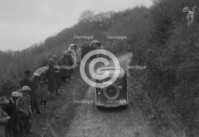 Standard saloon of AG Jones competing in the MCC Lands End Trial, 1935. Artist: Bill Brunell.
