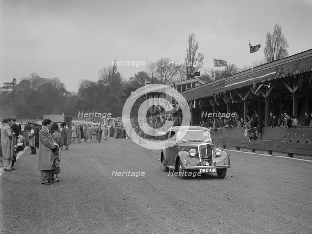 Standard saloon at a race meeting at Crystal Palace, London, 1939. Artist: Bill Brunell.