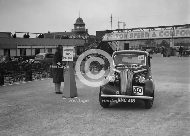 Standard saloon competing in the JCC Rally, Brooklands, Surrey, 1939. Artist: Bill Brunell.