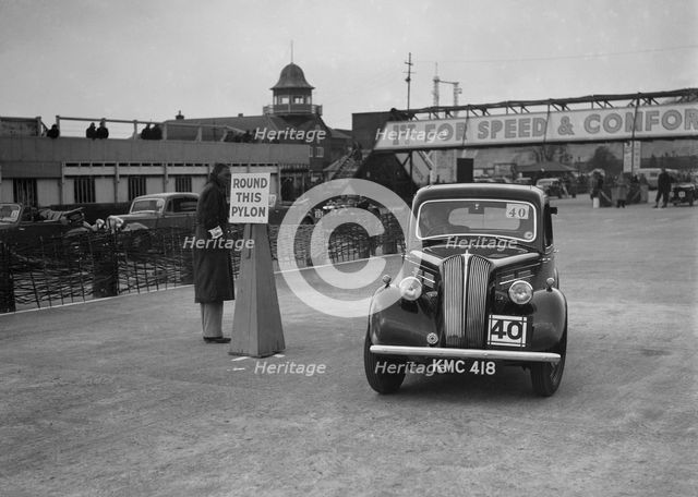 Standard saloon competing in the JCC Rally, Brooklands, Surrey, 1939. Artist: Bill Brunell.
