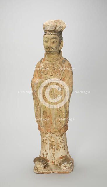 Standing Court Official, Style of Tang Dynasty (618-907) with later painted detail. Creator: Unknown.