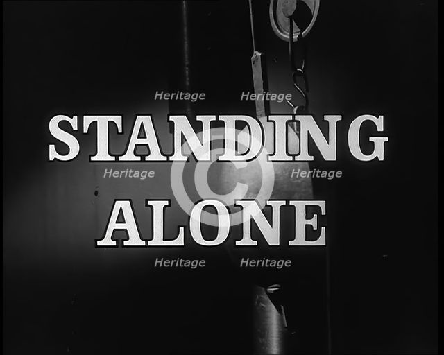 'Standing Alone' - title card, 1940.  Creator: British Pathe Ltd.