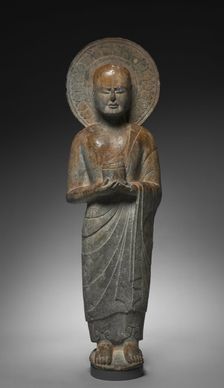 Standing Disciple Mahakasyapa Holding a Cylindrical Reliquary, c. 550. Creator: Unknown