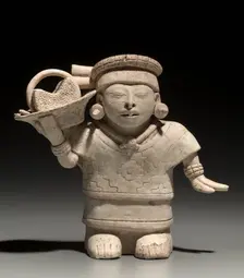 Standing Female with Basket, 600-1000. Creator: Unknown