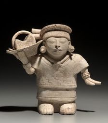 Standing Female with Basket, 600-1000. Creator: Unknown