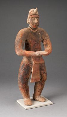 Standing Male Figure Holding a Plate, A.D. 100/400. Creator: Unknown