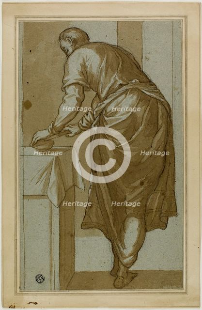 Standing Man Seen From Behind Cutting Bread, n.d. Creator: Unknown.