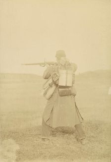 [Standing Soldier Aiming Rifle], 1880s-90s. Creator: Unknown