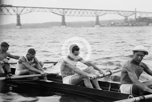 Stanford University crew rowing on Hudson River with Poughkeepsie Bridge..., between c1910-c1915. Creator: Bain News Service.
