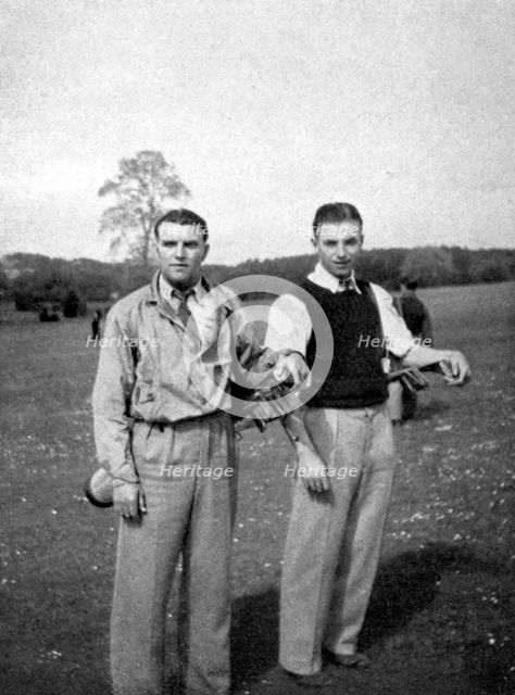 Stanley Matthews and Eddie Hapgood pause between shots during a round of golf, 1945. Artist: Unknown