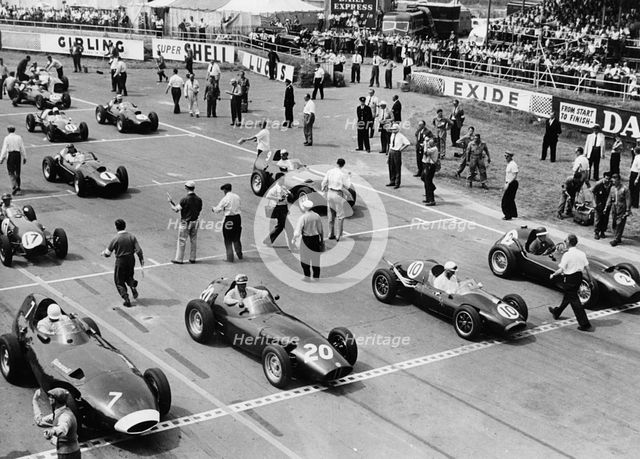 Starting grid,1958 British Grand Prix at Silverstone, Hawthorn in Ferrari number 1. Creator: Unknown.