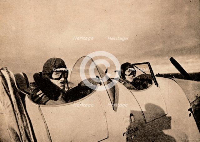 Starting on an instructional flight in a Miles Magister. The pupil is in the rear cockpit', 1940. Artist: Unknown
