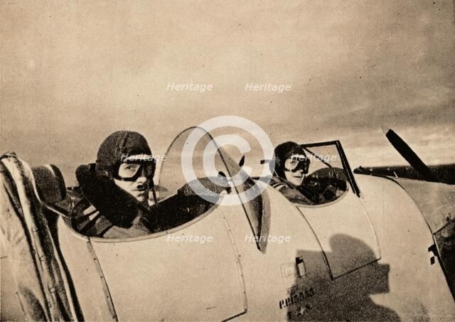 Starting on an instructional flight in a Miles Magister. The pupil is in the rear cockpit', 1940. Artist: Unknown