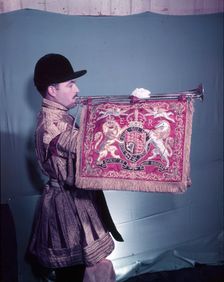 State trumpeter with ER cypher on banner, side view, London, c1953. Creator: Arthur Charles Kirby Ware