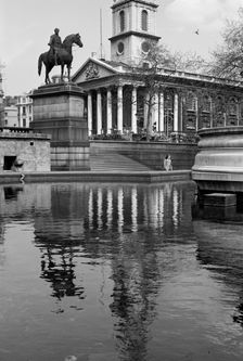 Statue outside St Martin in the Fields, Trafalgar Square, London, c1945-c1965. Artist: SW Rawlings