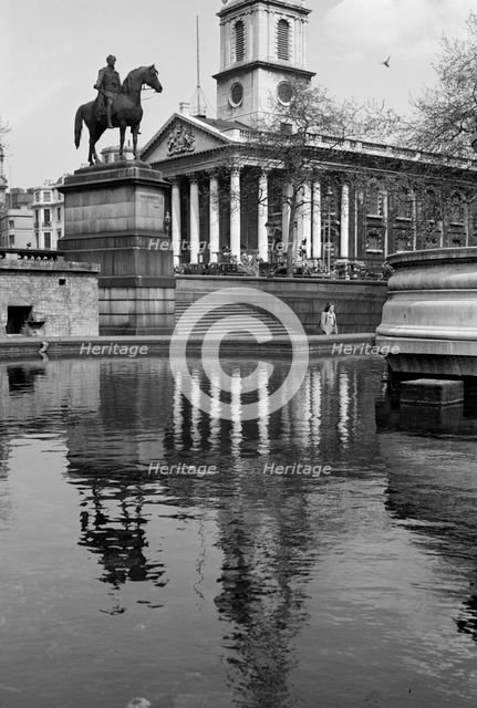Statue outside St Martin in the Fields, Trafalgar Square, London, c1945-c1965. Artist: SW Rawlings