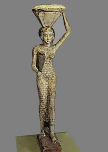 Statue of a bearer of offerings to a deceased (water and ox leg), made in polychromed wood