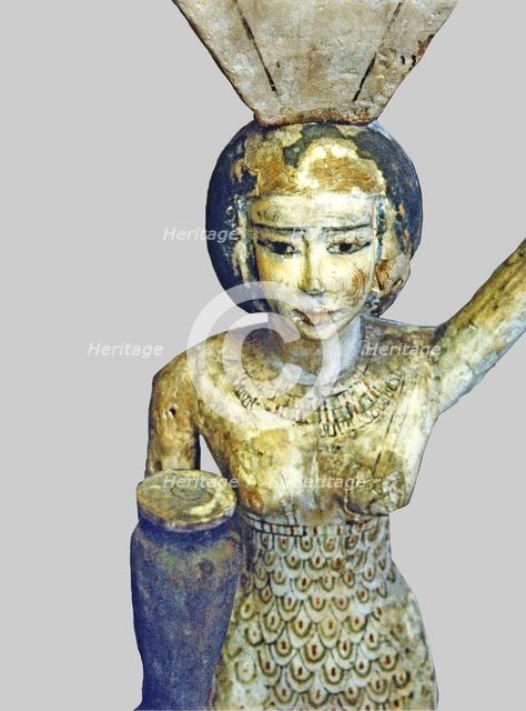 Statue of an offerings bearer to the dead (water and ox leg), made in polychromed wood, detail of…