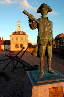 Statue of Captain Vancouver at dusk on the Purfleet Quay, King's Lynn, Norfolk. Creator: Peter Thompson