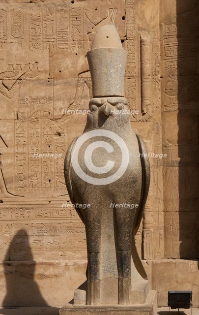 Statue of God Horus wearing the double crown..., Temple of Edfu, Egypt, Ptolemaic period, (2003).  Creator: LTL.