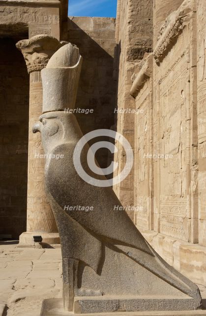 Statue of God Horus wearing the double crown..., Temple of Edfu, Egypt, Ptolemaic period, (2003).  Creator: LTL.