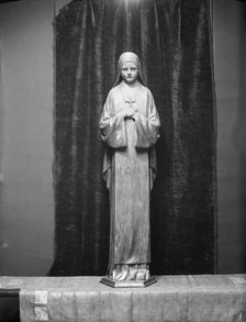 Statue of St. Theresa by Mario Korbel, between 1914 and 1928. Creators: Arnold Genthe, Mario Korbel