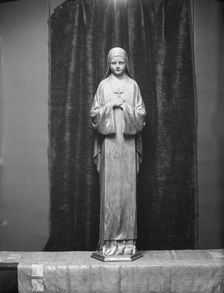 Statue of St. Theresa by Mario Korbel, between 1914 and 1928. Creators: Arnold Genthe, Mario Korbel