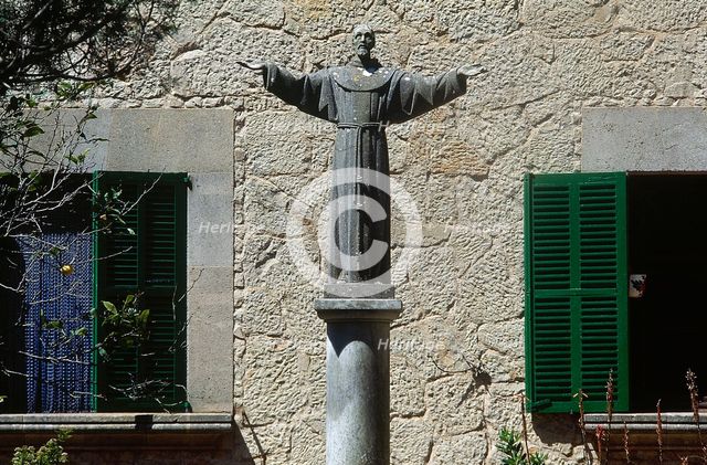 Statue of Saint Francis of Assisi, Garden of The Sanctuary of Cura de Randa, Majorca, Spain, (2001). Creator: LTL.