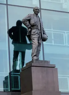 Statue of Sir Matt Busby outside Old Trafford football stadium, Manchester, c2000s. Artist: Historic England Staff Photographer