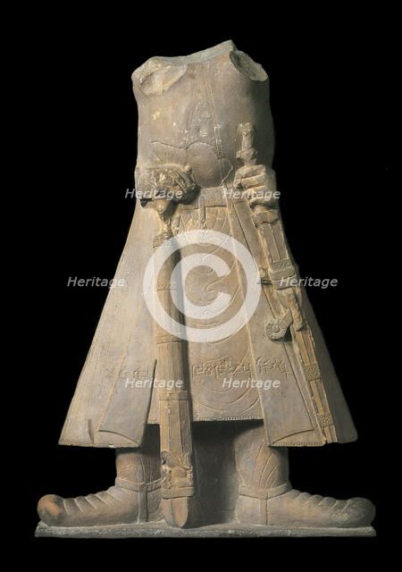 Statue of the emperor Kanishka with inscriptions in Brahmi Script, 1st-2nd century. Creator: Central Asian Art.