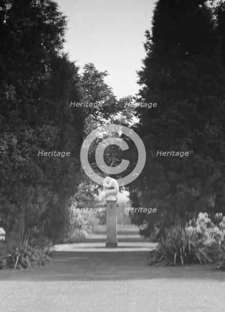 Statue by Paul Manship in the Griffin or Nissen Garden, 1931 June 14. Creator: Arnold Genthe.