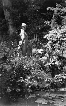 Statue by the pond, Park Place, Remenham, Berkshire, c1900. Creator: Farnham Maxwell Lyte
