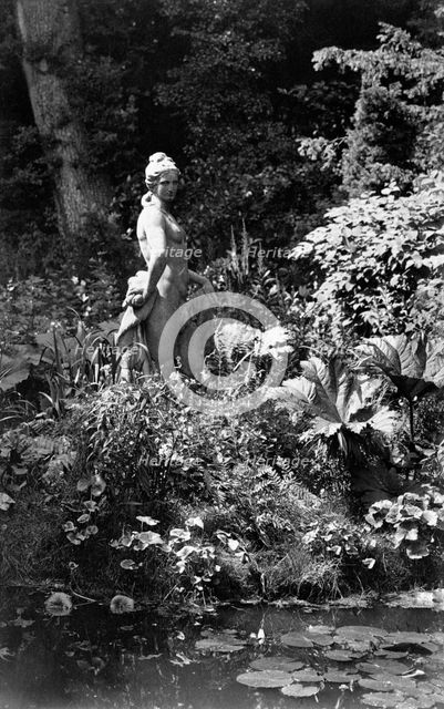 Statue by the pond, Park Place, Remenham, Berkshire, c1900. Creator: Farnham Maxwell Lyte.
